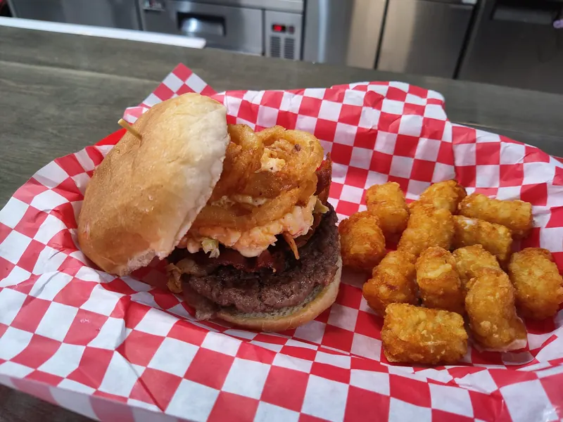 Burger with onion rings & tots